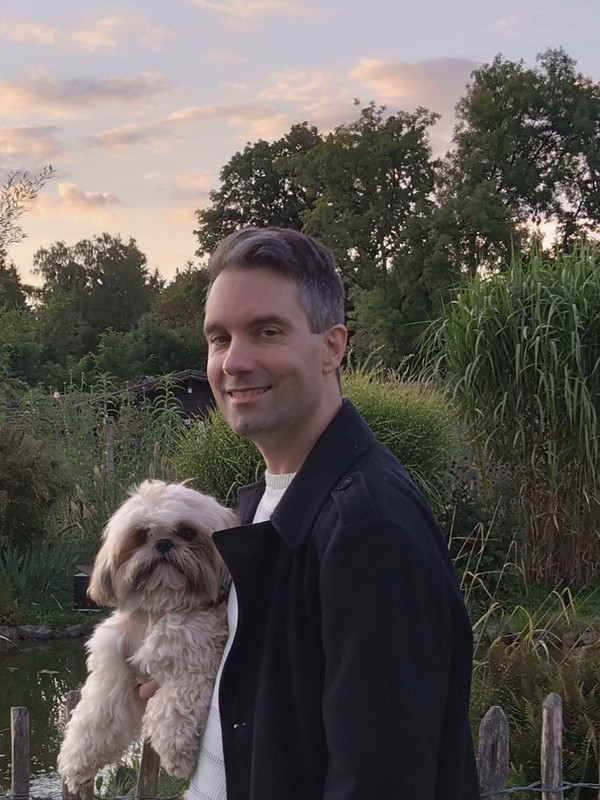 Oliver, founder of Admira Games, with his dog Lenny